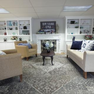 A cozy and modern living room setup with neutral-toned sofas and stylish decor.