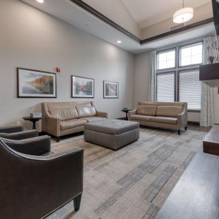 A modern living room with contemporary furniture and artwork.