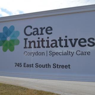 Sign for Care Initiatives located at 745 East South Street in Corydon, specializing in health care services.