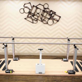 A set of parallel bars used for physical therapy and rehabilitation.