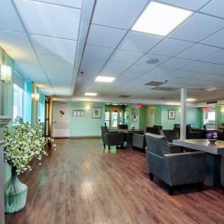 A modern lounge with comfortable seating and elegant decor.