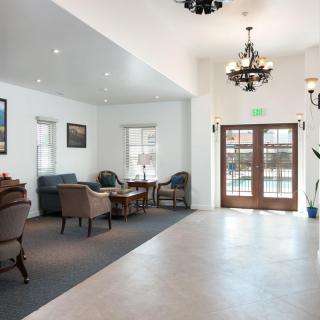 A spacious lobby area with comfortable seating and elegant lighting.