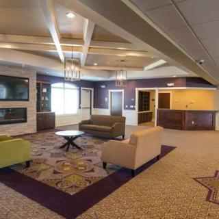 A modern lobby featuring comfortable seating and stylish decor.