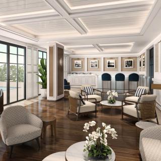 A modern and elegantly designed lounge area with comfortable seating and stylish decor.