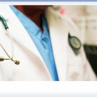 A medical professional wearing a lab coat and stethoscope.