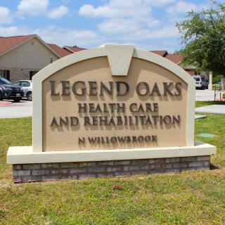 Sign for Legend Oaks Health Care and Rehabilitation facility.