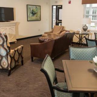 A cozy living room with comfortable seating and a television.