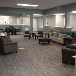 A spacious lobby with comfortable seating and modern decor.