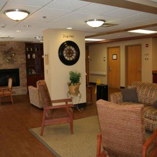 A cozy lobby area featuring comfortable seating and a warm, inviting atmosphere.
