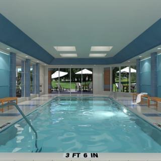 A serene indoor swimming pool with natural lighting and elegant design.