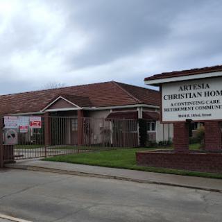 A view of a Christian community center with signage indicating its purpose.