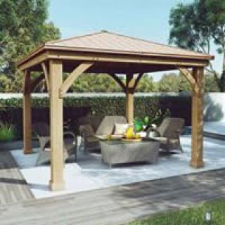 A cozy outdoor gazebo with seating and a table.