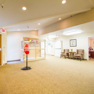 A bright, welcoming waiting area with comfortable seating and warm lighting.