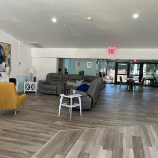A modern living room with comfortable seating and stylish decor.