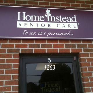 Exterior of a Home Instead Senior Care location with signage.