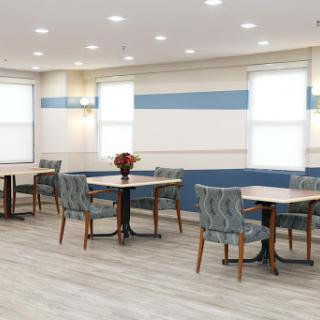 A cozy, modern dining area featuring stylish furniture and ample natural light.