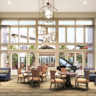 A spacious and elegant dining area featuring large windows, a grand piano, and modern furnishings.