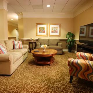 Cozy living room with comfortable seating and modern decor.