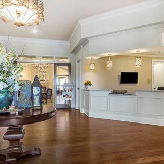 A welcoming lobby area with a reception desk and elegant decor.