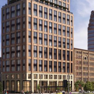 A modern high-rise building in an urban setting.