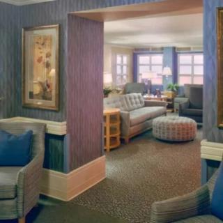 A cozy living room with comfortable furniture and tasteful decor.