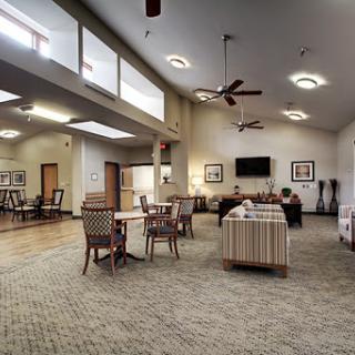 A cozy and spacious common area designed for relaxation and socializing.