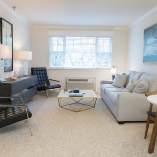 A modern living room with stylish furniture and decor.