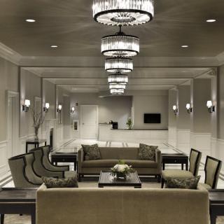 A luxurious and modern lobby with elegant lighting and comfortable seating.