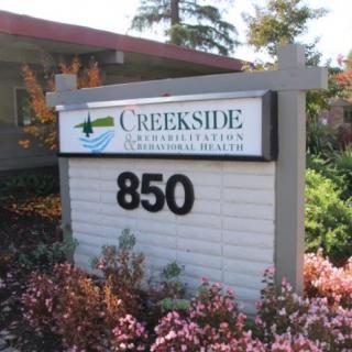 Sign for Creekside Mental Health and Recovery Services at address 850.