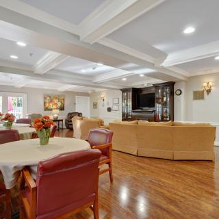 A spacious living area with comfortable seating and modern amenities.