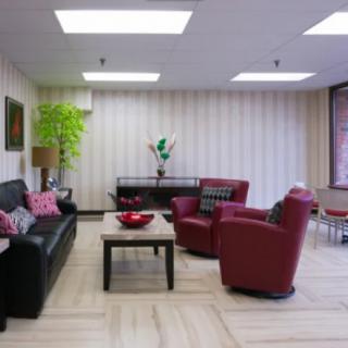 A modern living room with stylish furniture and elegant decor.
