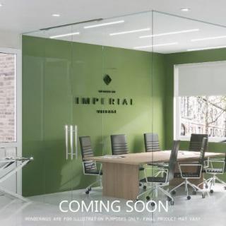 A modern conference room with a green accent wall and 'Coming Soon' text.