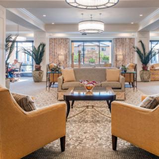 A luxurious hotel lobby with elegant seating and decor.