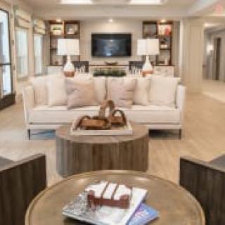 A modern living room with stylish furniture and decor.