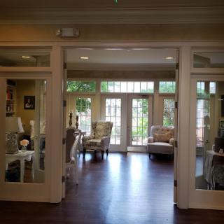 A beautiful and inviting living room filled with natural light and comfortable seating.