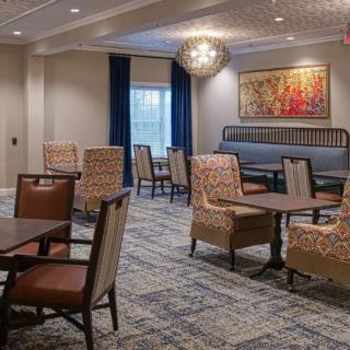 Elegant dining area with comfortable seating and modern decor.