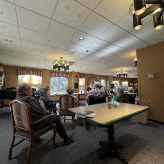 A cozy common room where people gather and socialize.