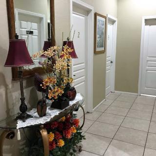 A welcoming hallway with decorative elements and soft lighting.