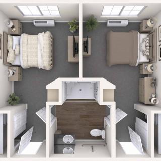 A top-down view of a two-bedroom apartment floor plan featuring a shared bathroom and well-organized living spaces.