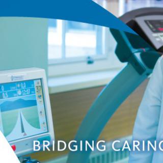 A healthcare professional using medical equipment for patient monitoring.