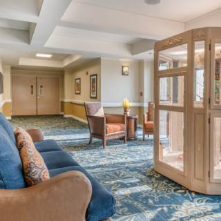 A cozy lobby area with comfortable seating and elegant decor.