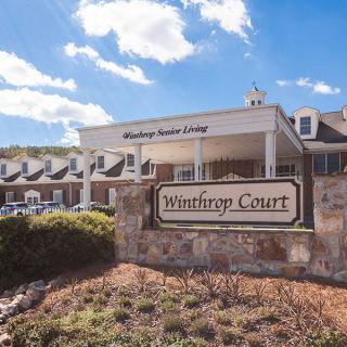 Winthrop Court senior living facility on a sunny day.
