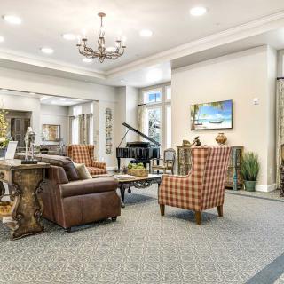 A sophisticated lobby with comfortable seating and elegant decor.