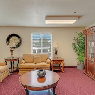 A cozy living room with comfortable seating and stylish decor.