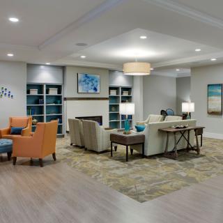 A modern living room with comfortable seating and tasteful decor.