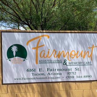 Sign for Fairmount Apartments & Townhomes in Tucson, Arizona.