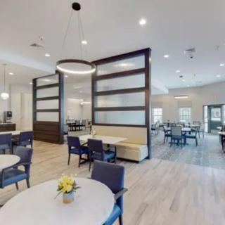 A modern dining area with stylish seating and contemporary lighting.