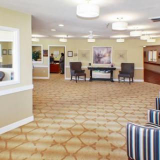 A spacious and inviting lobby area with comfortable seating and modern decor.