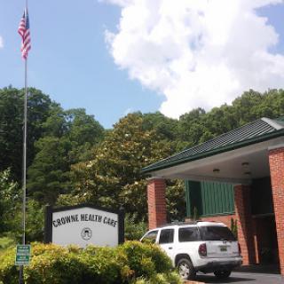 A serene view of a recreational facility with a flag flying in the background.