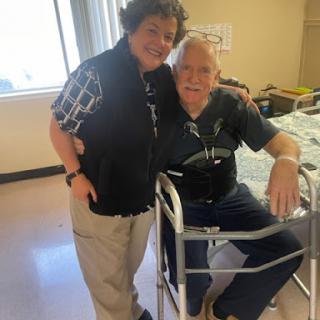 A moment of support and recovery in a hospital setting.